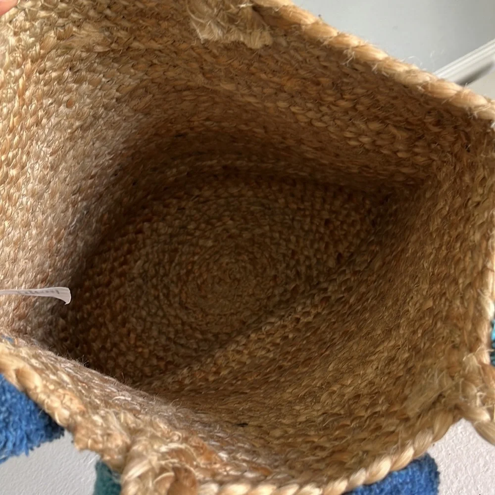 - Anthropologie Jute Braided Tote bag with  Pom Pom